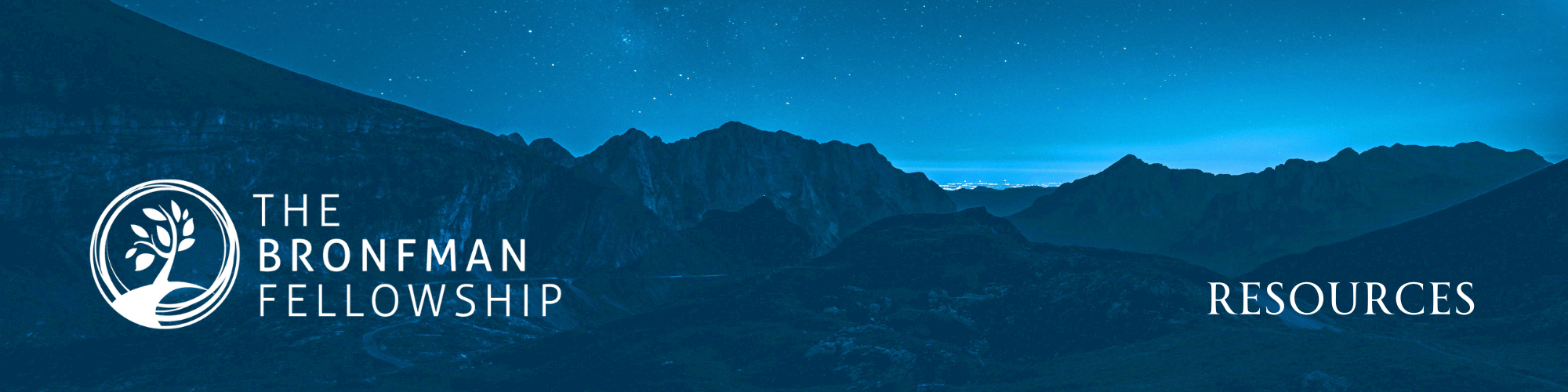 A banner showing mountains under a dark blue sky.