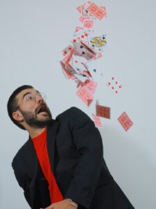 Omri Bitton with a deck of playing cards.