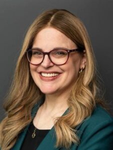 Picture of Rena Nickerson, woman with long blonde hair and glasses.