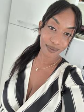 Picture of Sara Abebe, in black and white shirt.