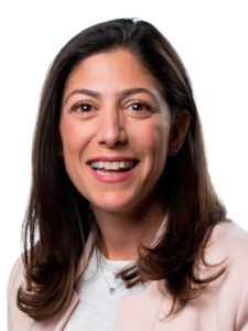 Picture of Shira Fishman; she is smiling and has brown hair past her shoulders.
