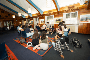 Fellows talking together in a circle.