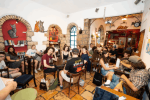 Fellows eating together in Jerusalem.
